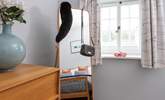 The hanging rail is cleverly hidden behind the mirror - Thumbnail Image