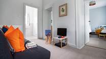 The upstairs landing has the Wii station and a sofa to put your feet up.