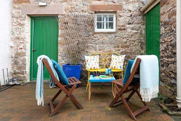 Sit awhile in the pretty courtyard.
