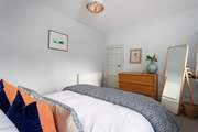 The king-size double bedroom is so calm and relaxing, what pretty linen.