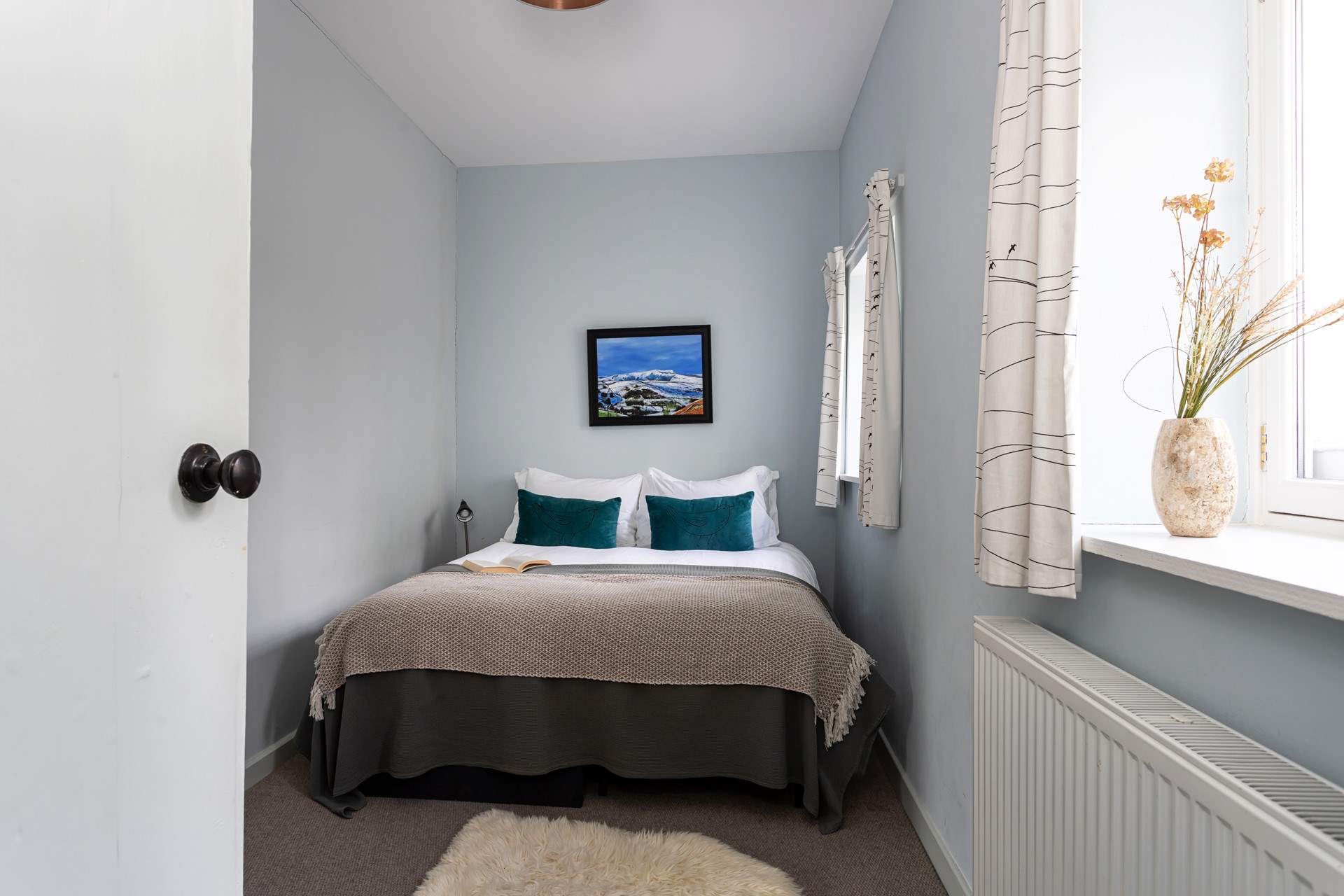 This king size bed can be separated into a twin for children.