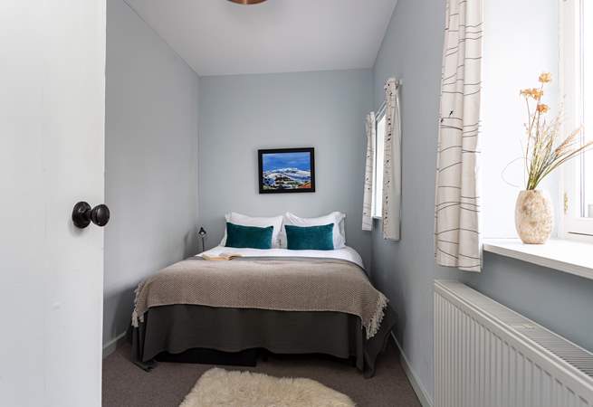 This king size bed can be separated into a twin for children.