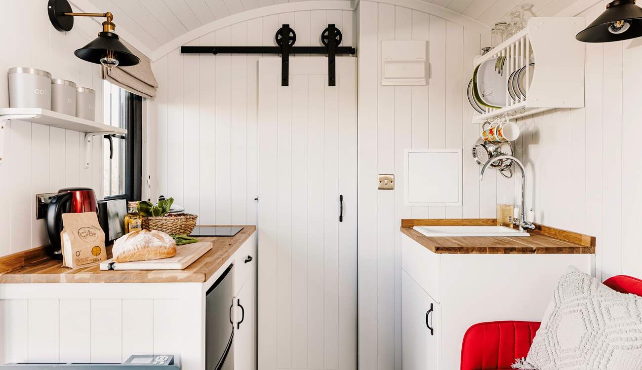 The stylish kitchen is superbly equipped for two.