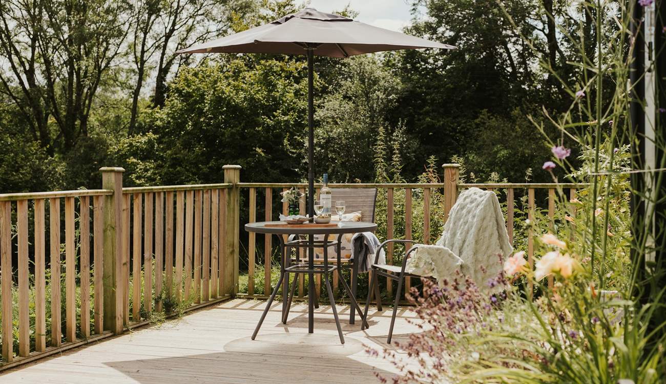 Dine on the deck as the sun slips beyond the horizon. 