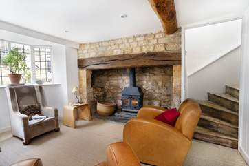 Relax in front of the cosy wood-burner.