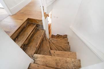 The winding wooden staircase.