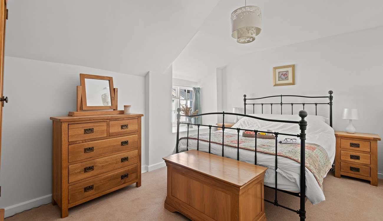 Bedroom 1 is a charming room with a king-size bed.