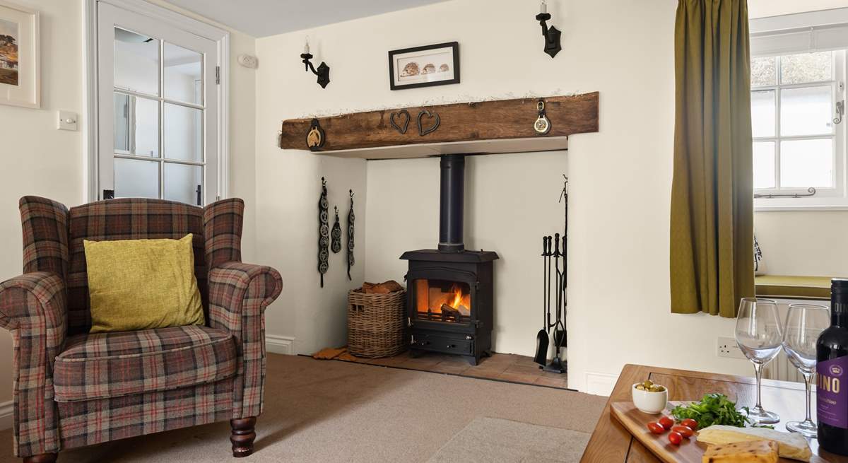 Sink into the armchair next to the wood-burner, and relax...