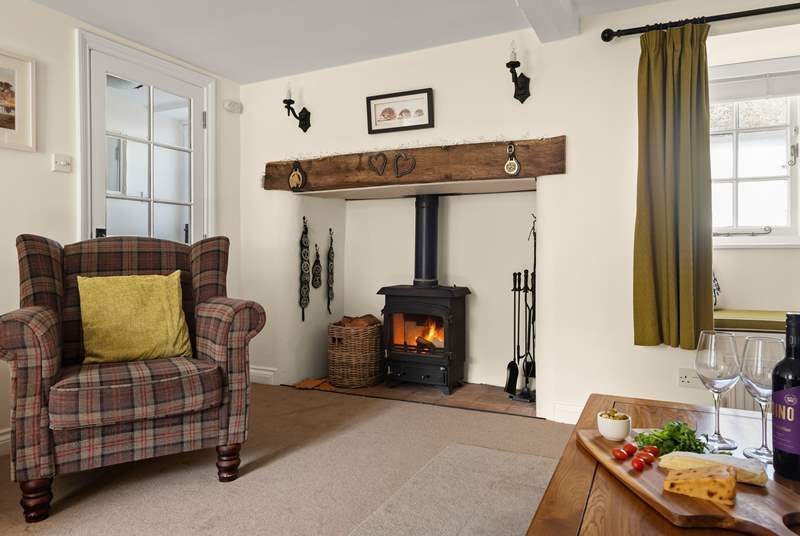 Sink into the armchair next to the wood-burner, and relax...