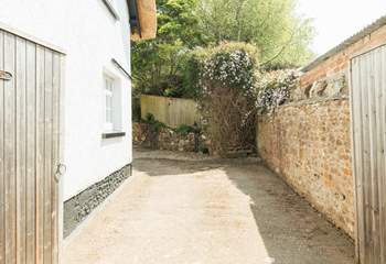 Open the gates to the parking area.