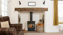 Sink into the armchair next to the wood-burner, and relax...