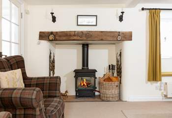 Sink into the armchair next to the wood-burner, and relax...