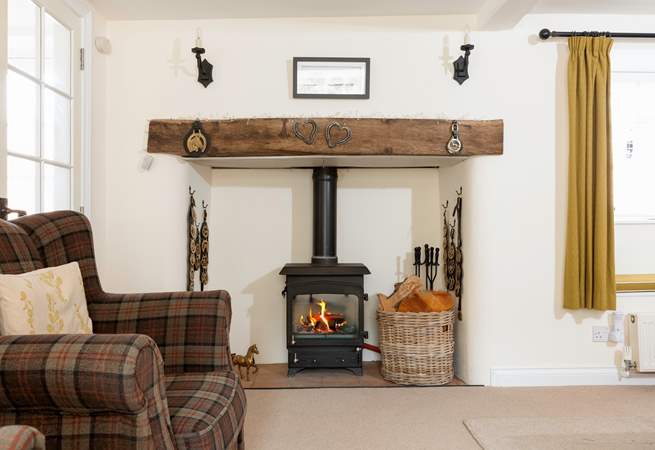 Sink into the armchair next to the wood-burner, and relax...