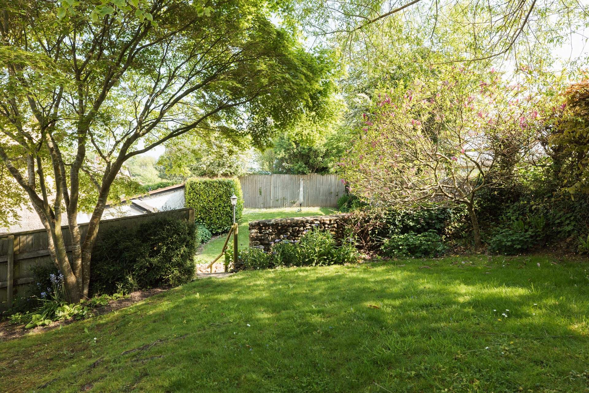 The lawn is perfect for picnics in the dappled sunshine.