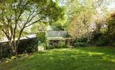 The lawn is perfect for picnics in the dappled sunshine. - Thumbnail Image