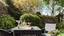 Relax in the sunshine with a glass of your favourite tipple.