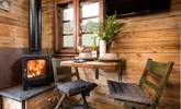 Watch the embers soften as you stay snug by the wood-burner. - Thumbnail Image