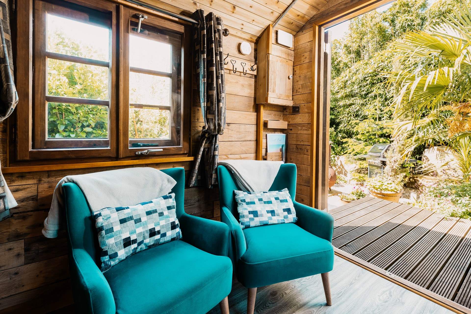 Open the double doors and enjoy the sounds of the nature that surrounds you.