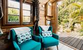 Open the double doors and enjoy the sounds of the nature that surrounds you. - Thumbnail Image