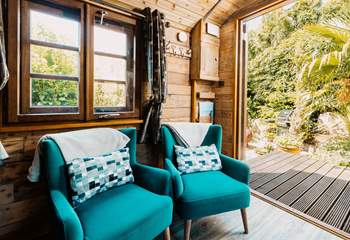 Open the double doors and enjoy the sounds of the nature that surrounds you.