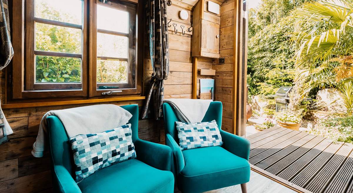Open the double doors and enjoy the sounds of the nature that surrounds you.