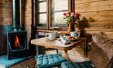 The cosiest dining spot to enjoy breakfast by the warming wood-burner.  - Thumbnail Image