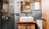 The internal ensuite shower room is located to the rear of the hut. - Thumbnail Image