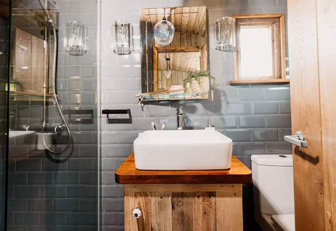 The internal ensuite shower room is located to the rear of the hut.