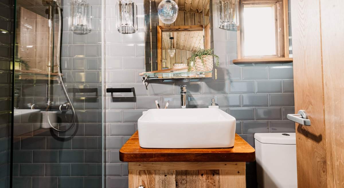 The internal ensuite shower room is located to the rear of the hut.