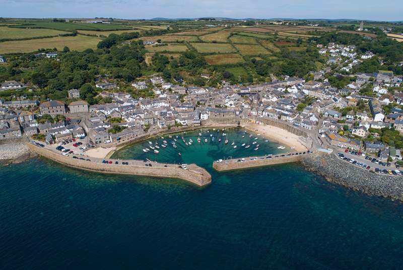 The gorgeous Cornish fishing village of Mousehole is as pretty as a picture. 