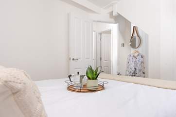 This pretty room is on the first floor with bedroom 2 and the family shower-room.