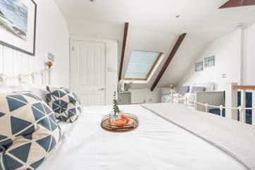 The Velux window makes bedroom 3 light and inviting. This bedroom has limited headroom, so please take care on the low beams.