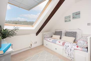 This cosy space in bedroom 3 is perfect for chilling out with a good book.
