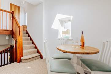 The dining space is perfect for three.