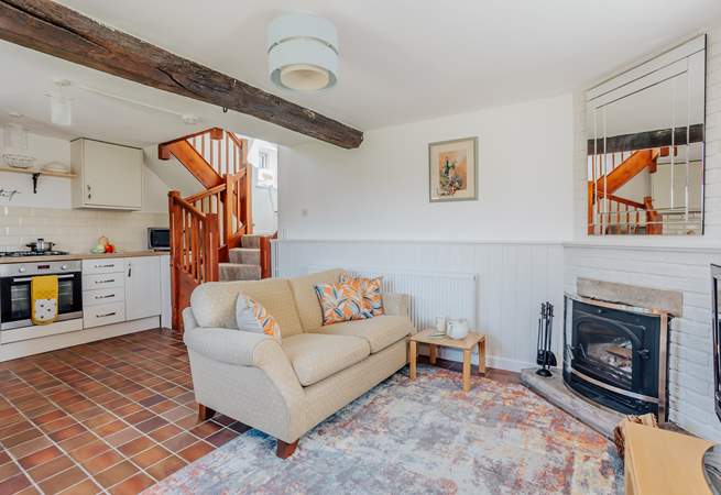 Open plan living with a cosy wood-burner for those cooler nights.
