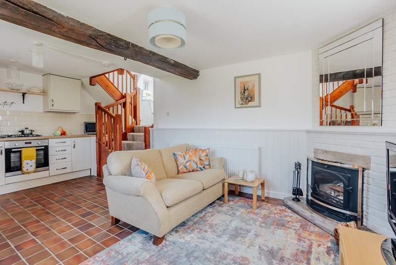 Open plan living with a cosy wood-burner for those cooler nights.