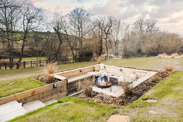 Step down into the cosy fire-pit area and share stories under the stars!