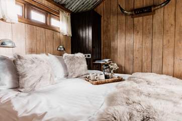 Rest your head in the sumptuous king-size bed for a dreamy night's sleep.