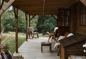 The covered decking is perfect for indoor and outdoor living. 