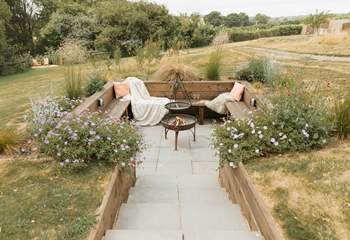 Step down into the cosy fire-pit area and share stories under the stars!