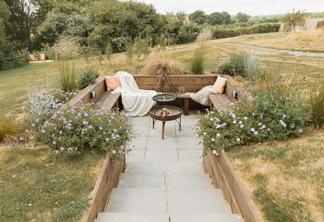 Step down into the cosy fire-pit area and share stories under the stars!