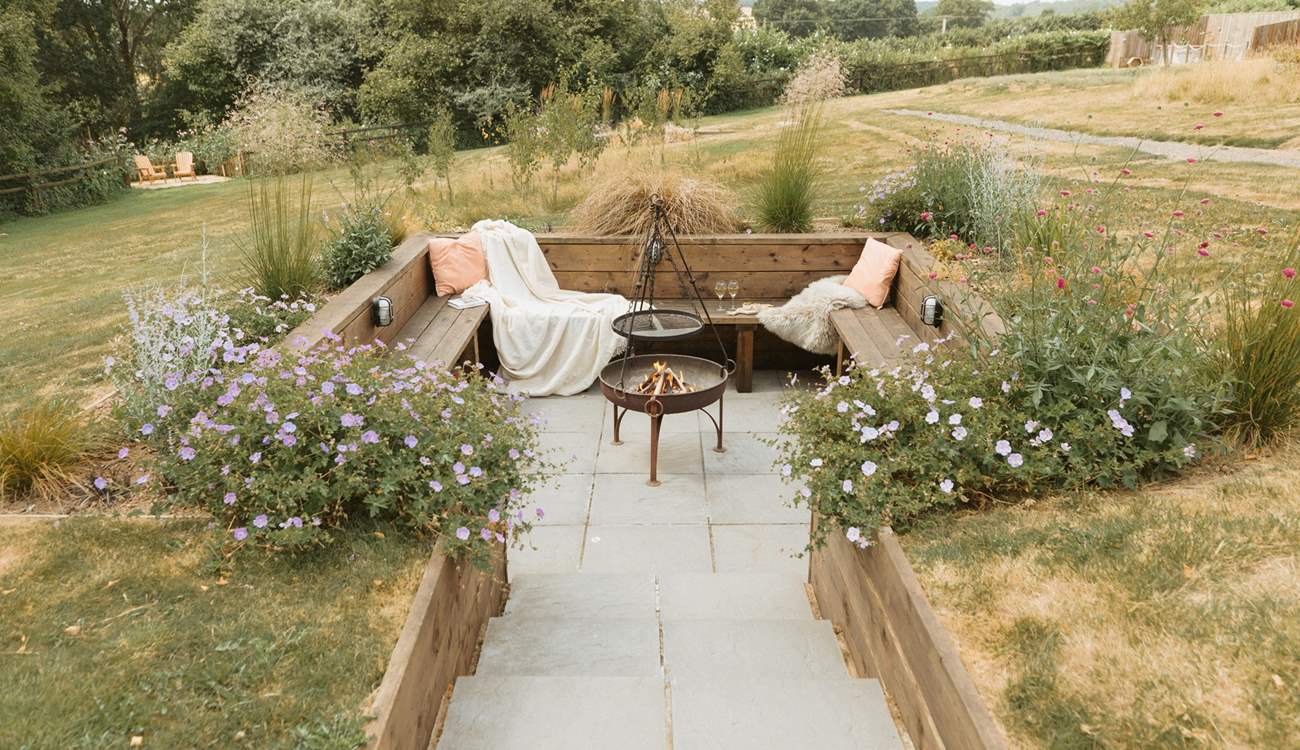 Step down into the cosy fire-pit area and share stories under the stars!