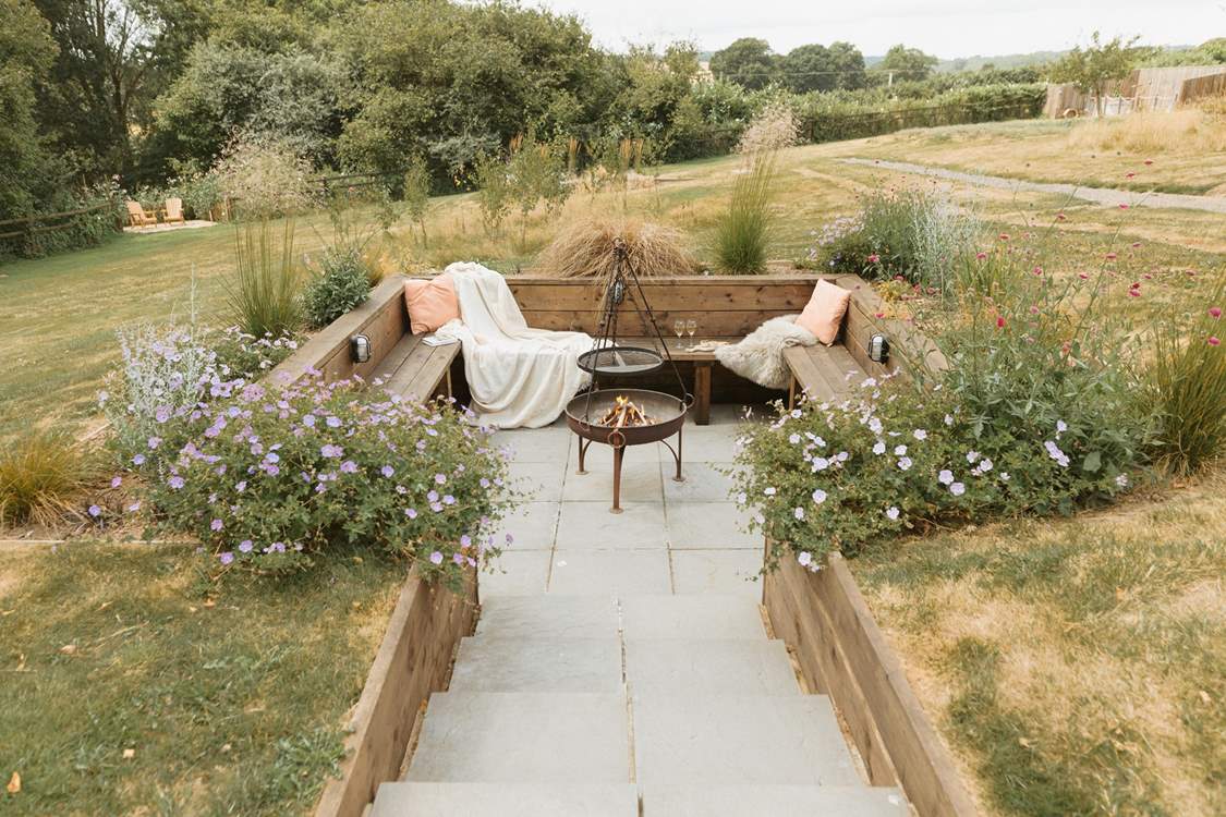 Step down into the cosy fire-pit area and share stories under the stars!