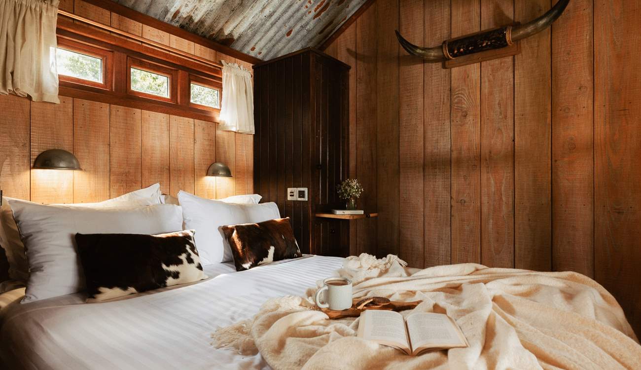 Rest your head in the sumptuous king-size bed for a dreamy night's sleep. 