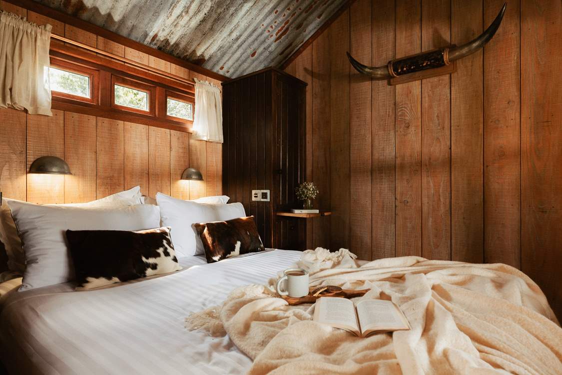 Rest your head in the sumptuous king-size bed for a dreamy night's sleep.