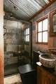 We love the copper details in the gorgeous shower-room.