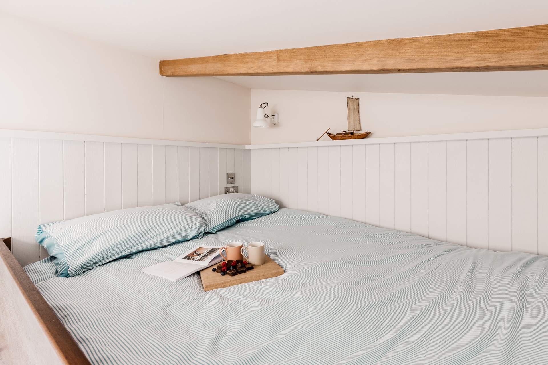 Climb the ladder to find your lovely king-sized bed. 