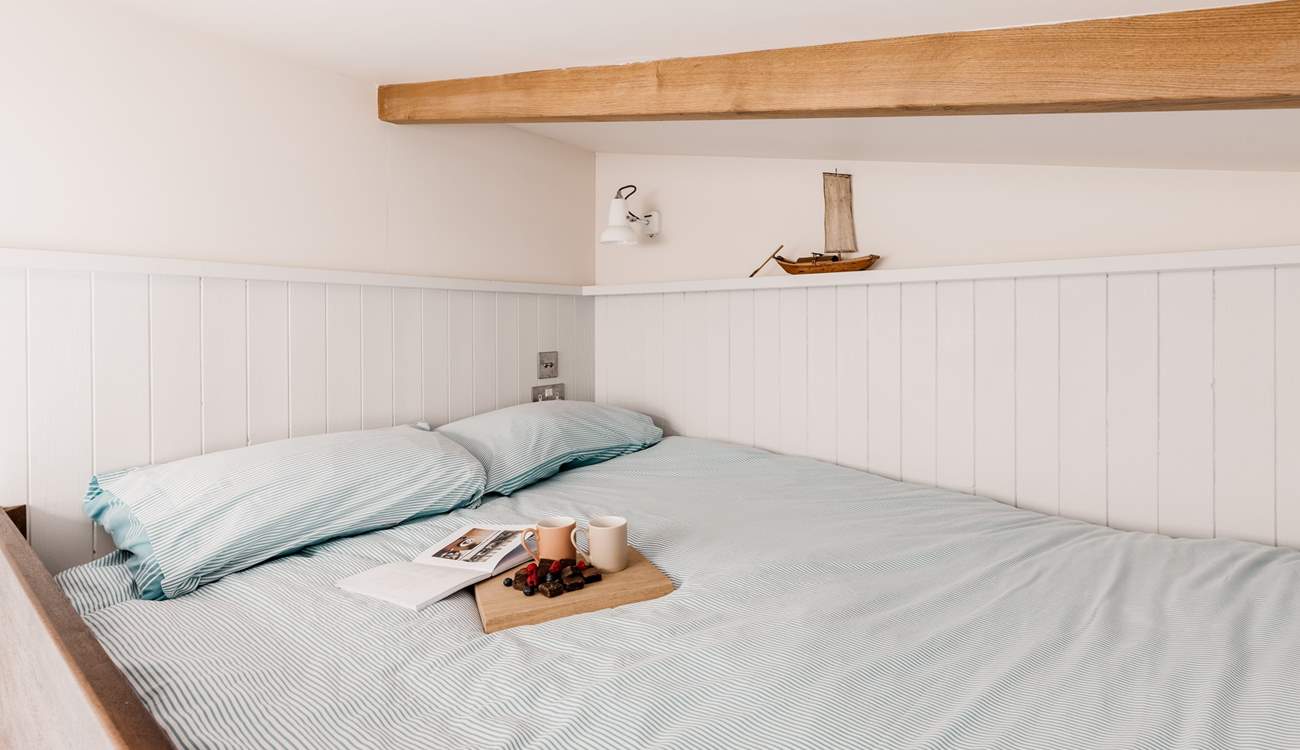 Climb the ladder to find your lovely king-sized bed. 