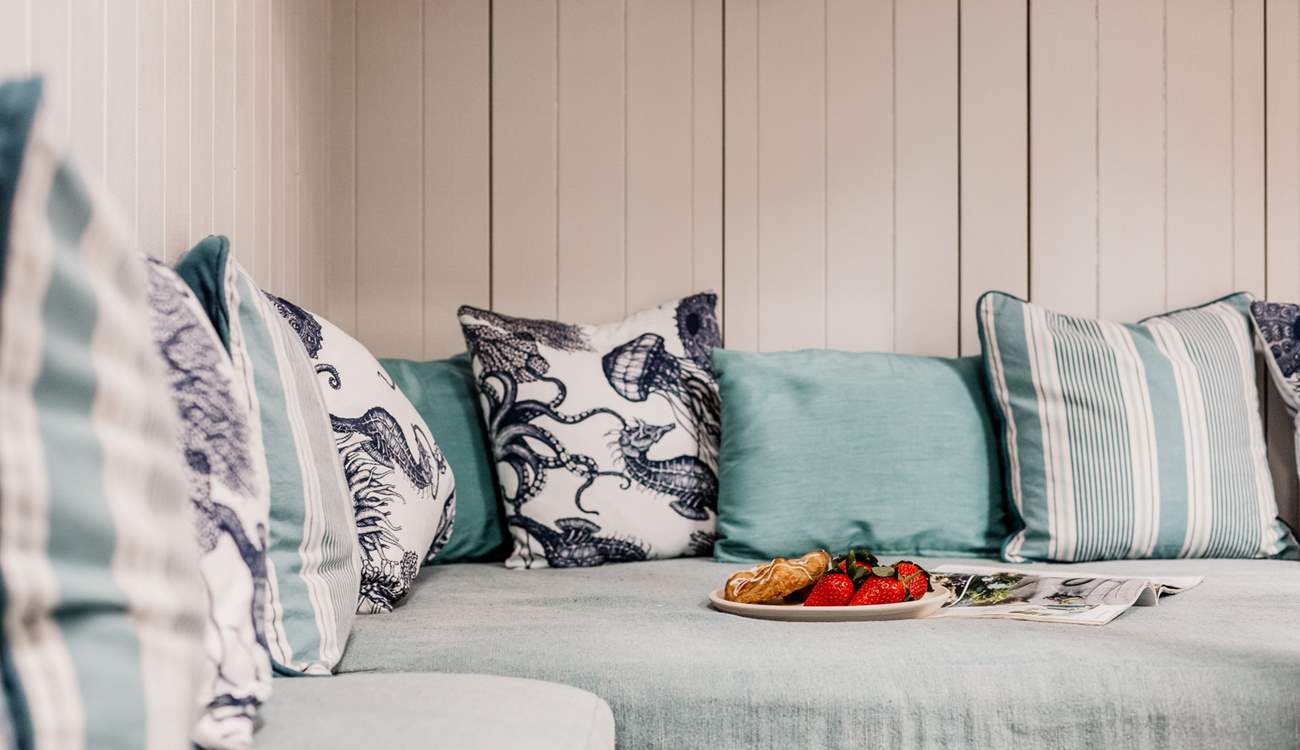 Sumptuous soft furnishings run throughout. 