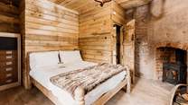 As you head up the stairs you will find the two bedrooms. This is the main bedroom with a comfy double bed. 